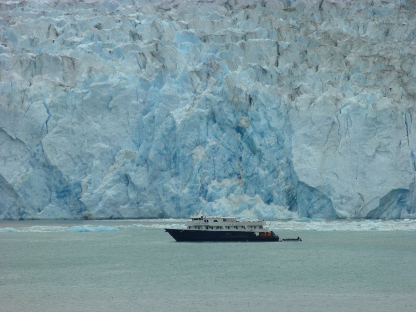 small boat, blue ice