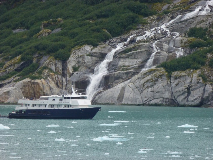 small boat, waterfall
