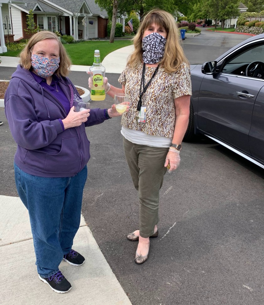 women holding margaritas